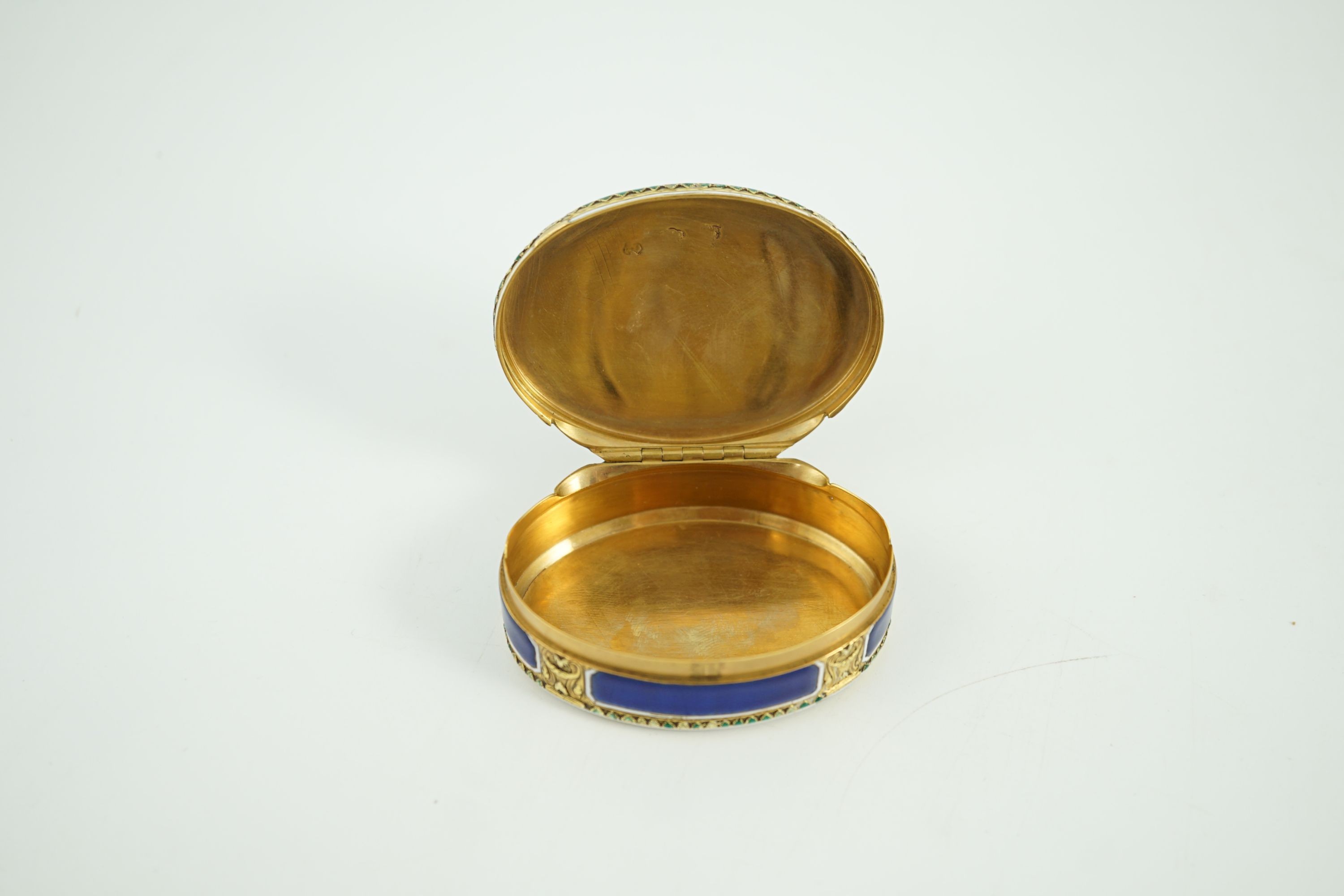 A late 18th/early 19th century French? gold and polychrome enamel oval snuff box